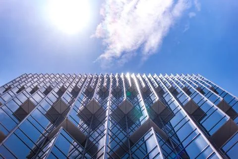 Underside panoramic and perspective view to steel blue glass high rise buildi 스톡 사진