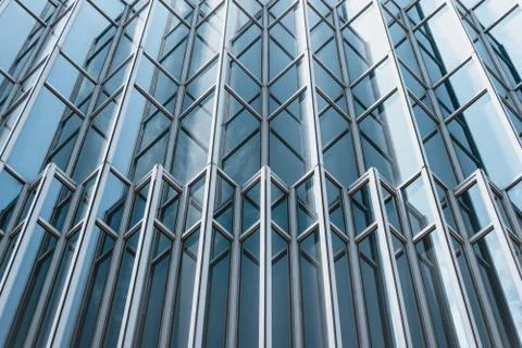 Underside panoramic and perspective view to steel blue glass high rise buildi Stock Photos