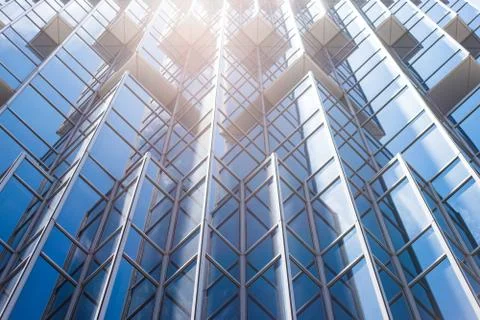 Underside panoramic and perspective view to steel blue glass high rise buildi Stock Photos