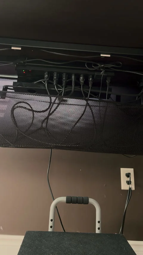 Underside of Standing Desk with Mounted Power Strip, Cable Management, as Desk Stock Footage 320941910