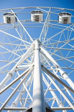 Underside view of a white ferris wheel Stock Photos