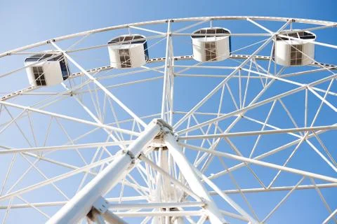 Underside view of a white ferris wheel Stock Photos