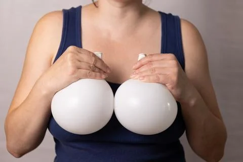Understanding Changes in Breasts After Pregnancy and Aging and the Role of .. Stock Photos