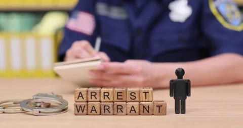 Understanding the process of issuing an arrest warrant in a police setting Stock Footage 320632813