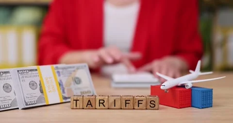 Understanding tariffs through a hands-on approach with money and models Stock Footage 319070262