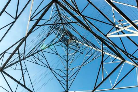 Underview of Structured  Metal Engineering of Overhead Electricity Pylon Stock Photos