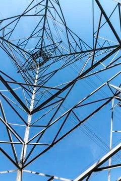 Underview of Structured  Metal Engineering of Overhead Electricity Pylon Stock Photos