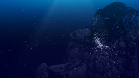 Underwater air bubbles dance in front of rocks  (Loop) Stock Footage 83452220
