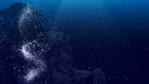 Underwater air bubbles dance in front of rocks  (Loop) Stock Footage 83479308