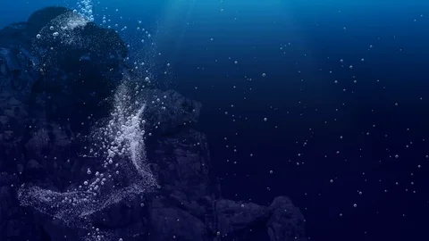 Underwater air bubbles dance in front of rocks  (Loop) Stock Footage 83479324