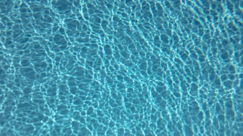 Underwater background, Slow motion glare of sunlight on the bottom.   Stock Footage 170220418