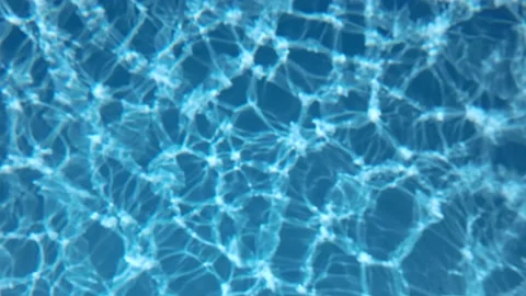 Underwater background, Slow motion glare of sunlight on the bottom.  Stock Footage 170220712