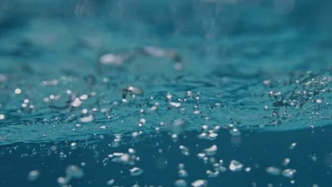 Underwater bubble turbulence beneath tropical ocean surface in super slow motion Stock Footage 335357841
