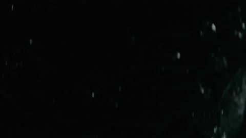 Underwater bubbles of air in the dark Stock Footage 169089663