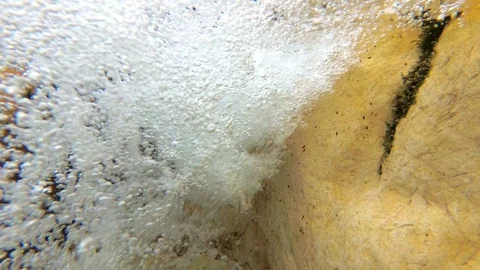 Underwater bubbles from a mountain river waterfall, pure water Stock Footage 94450132