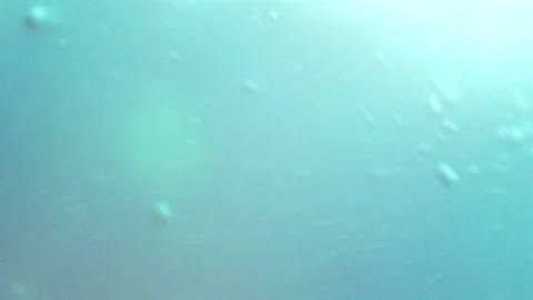 Underwater bubbles in ocean of blue Stock Footage 145921265