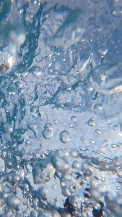 Underwater bubbles rising inside breaking ocean wave Stock Footage 342161017