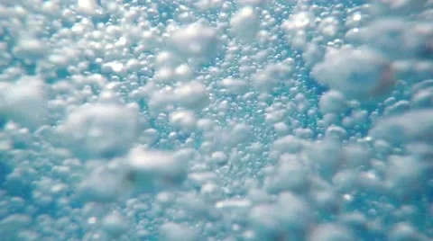 Underwater bubbles from thermal spring pool SLOW MOTION Stock Footage