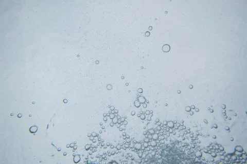 Underwater bubbles viewed from below Stock Photos