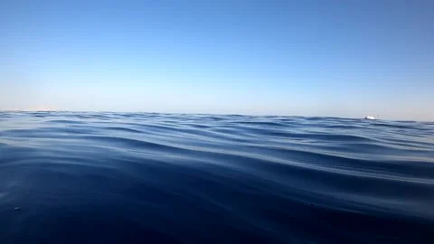 Underwater camera plunges over down into the water and into the depths of Egypt Stock Footage 164325823