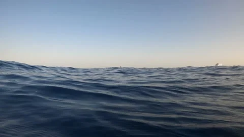 Underwater camera plunges over down into the water and into the depths of Egypt Stock Footage 164404517