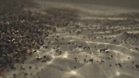 Underwater current flowing over a sandy riverbed Stock Footage 333203760