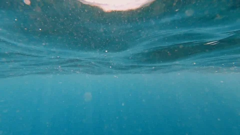 Underwater light creates a beautiful veil, consisting of sunlight. Real footage Video stock 116257971