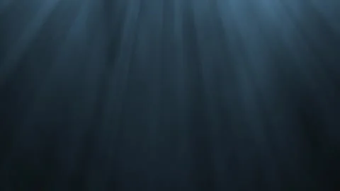 Underwater light rays shining down from the surface creating an atmospheric.. Stock Footage 340538416