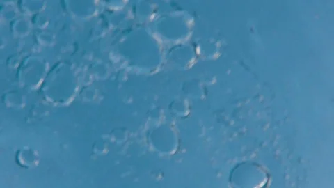 Underwater looking up at bubbles on the waters surface 120f. Stock Footage 89946371