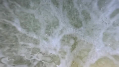 Underwater macro footage of dense bubbles rising through water as camera mo.. Stock Footage 332442910