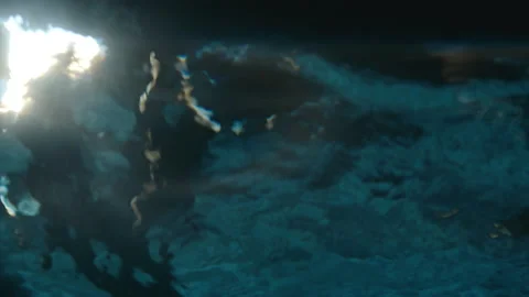 Underwater at night looking up at lights Stock Footage 169201050