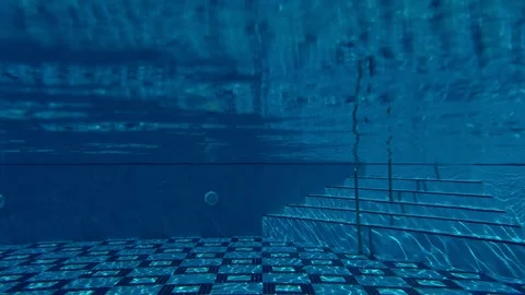 Underwater pool camera capture shows beautiful rippling water patterns, light Video stock 321764993
