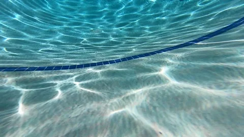 Underwater pool swimming to drain in Austin, Tx 8/5/2026 Stock Footage 341533445