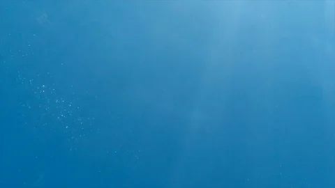 Underwater rays of the sun. Underwater background Video stock 76901661