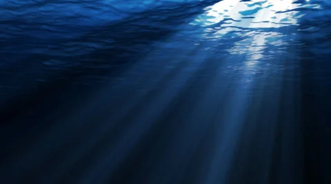 Underwater scene with sunrays shining through the water's surface Stock Footage 32866813