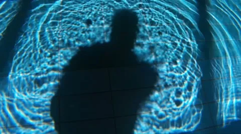 Underwater Shadow Of Man And Waves On Swimming Pool Stock Footage 68957568