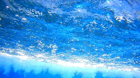 Underwater shooting in the pool mini waterfall Video stock 94032067