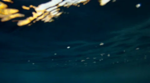 Underwater shot of a maxi rib navigating Stock Footage 50968559