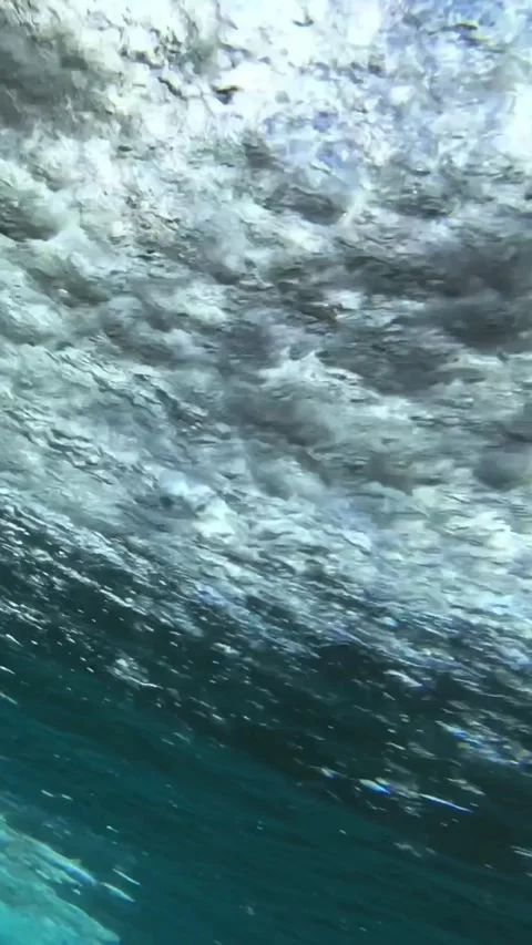 Underwater shot of ocean wave.slow motion.Vertical video Stock Footage 296203961