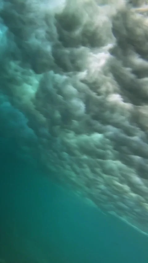 Underwater shot of ocean wave.slow motion.Vertical video Stock Footage 296203979
