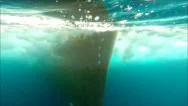 Underwater Shot Of Ship Ramming Stock Footage