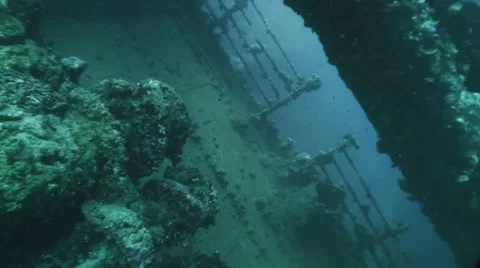 Underwater shot of sunken ship wreck, wreck aside Stock Footage