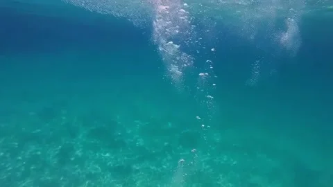 Underwater slow motion bubbles moving to surface 2 Stock Footage 285234504