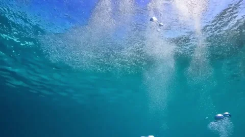 Underwater slow motion bubbles moving to surface 5 Stock Footage 285234506