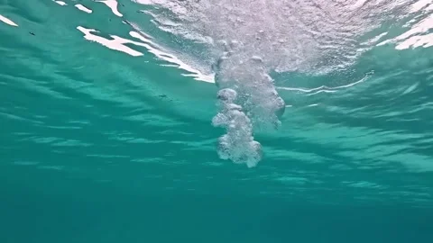 Underwater slow motion bubbles moving to surface 3 Stock Footage 285234507