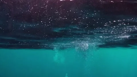 Underwater slow motion bubbles moving to surface 4 Stock Footage 285234510
