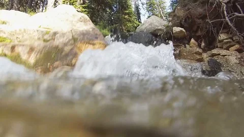 Underwater in small rushing stream waterfall Elkhorn Mountains Oregon Wallowa 86 Video stock 81930433