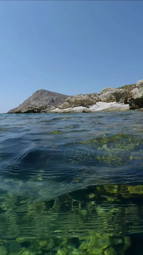Underwater split level, coastal rocky landscape with rocky shore and underwater Stock Footage 255111827