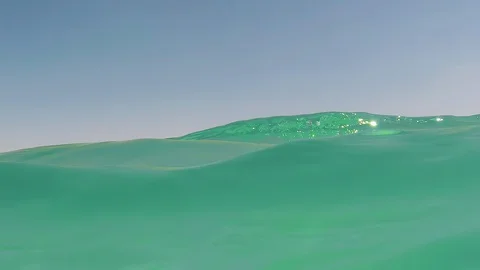 Underwater split shot view showing above and below the water level of the Dea Video stock 127860192