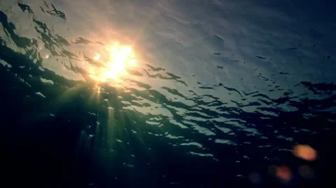 Underwater suface sunset Stock Footage 10760560